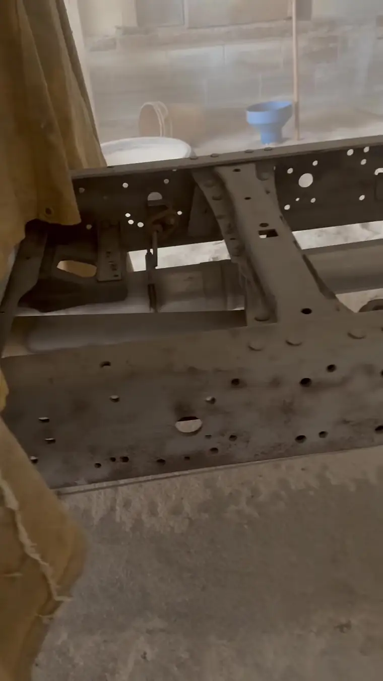 Truck frame crossmember blasted to bare steel