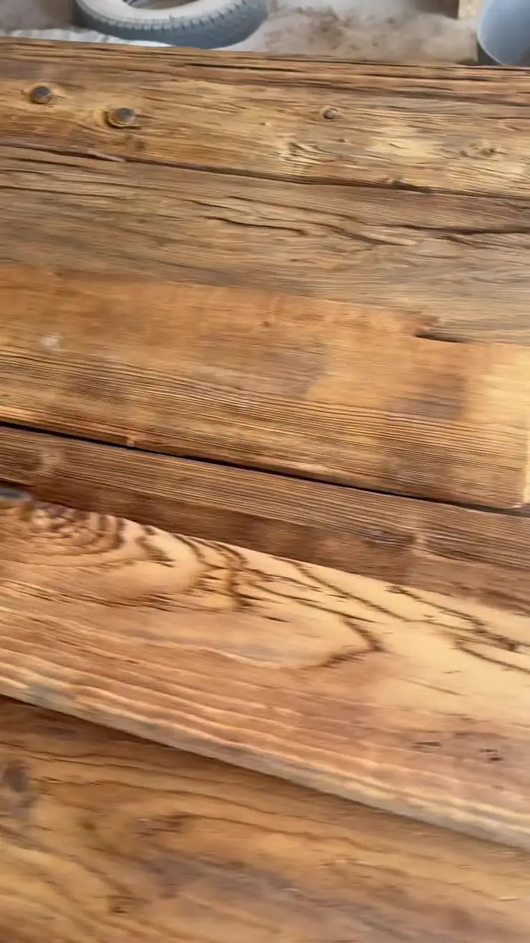 Close-up of sandblasted wood boards with deep raised grain