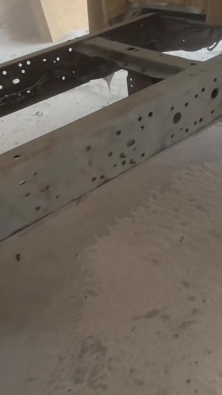Truck frame rail blasted to bare steel
